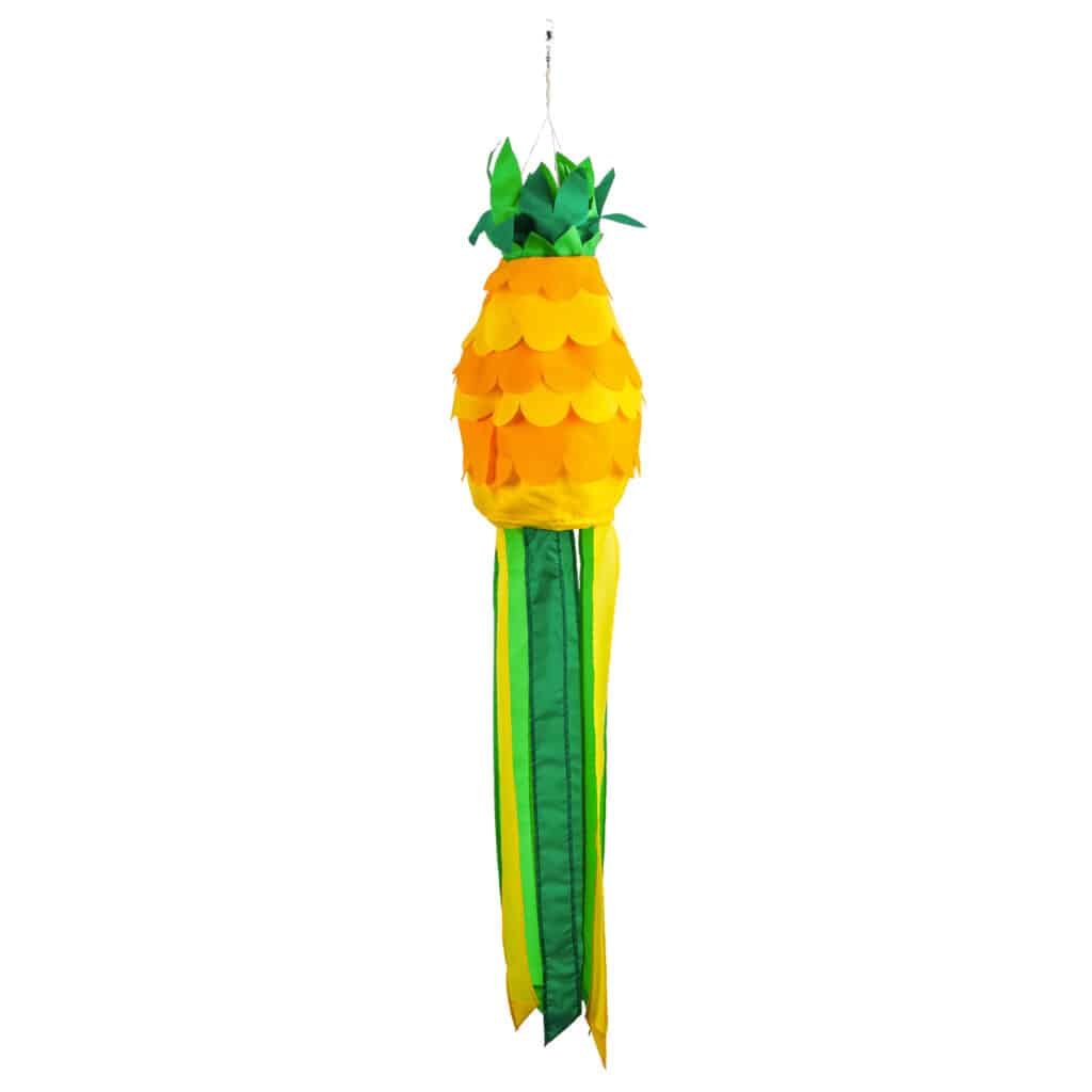 Yellow pineapple windsock with green flowing ribbons on bottom for summer beach or pool outdoor decor.