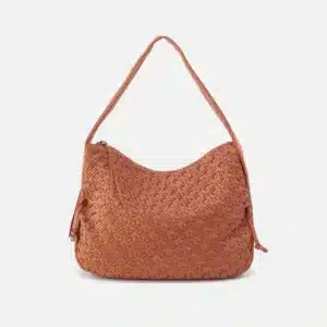 Woven leather shoulder bag in a warm tan color, featuring an intricate basketweave pattern, zip-top closure, and a single shoulder strap. The stylish handbag is displayed against a white background.